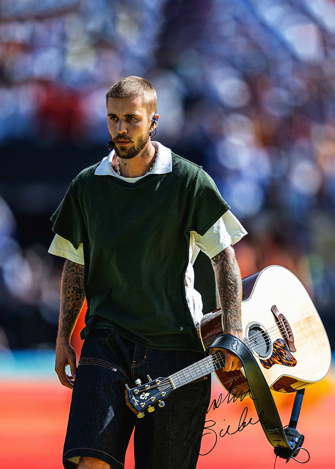 Justin Bieber Carrying Acoustic Guitar