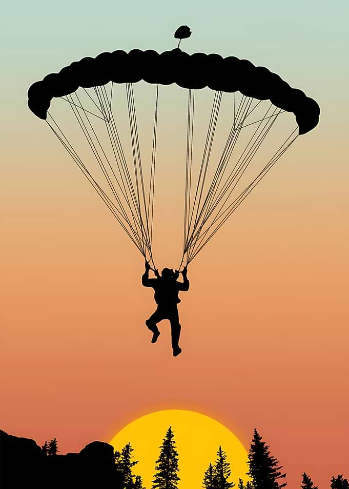 Paraglider Silhouette at Sunset