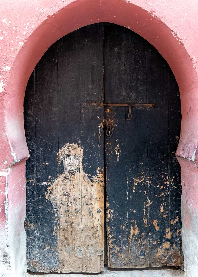 Weathered Moorish Doorway with Portrait
