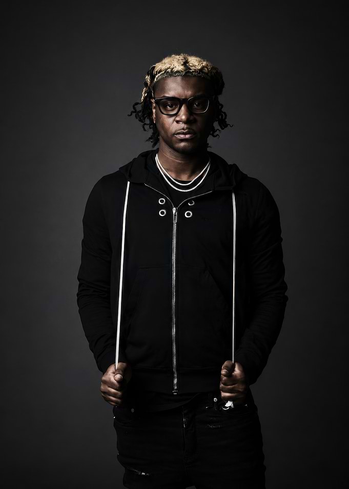 Portrait of a stylish man in hoodie