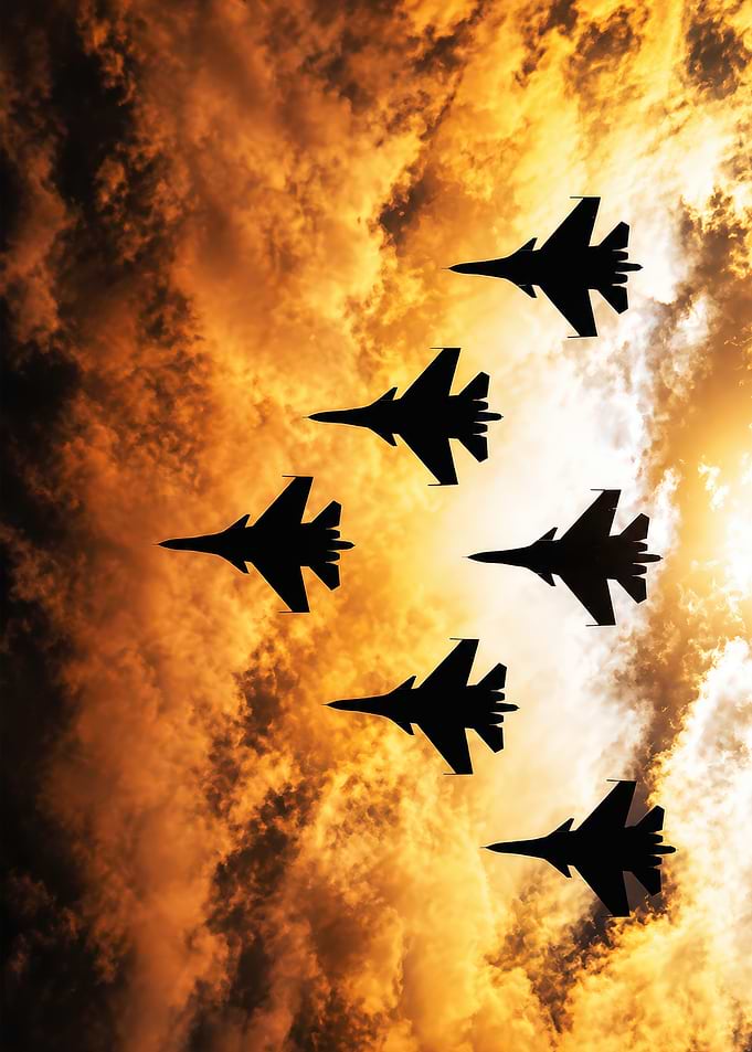 Fighter Jet Formation at Sunset