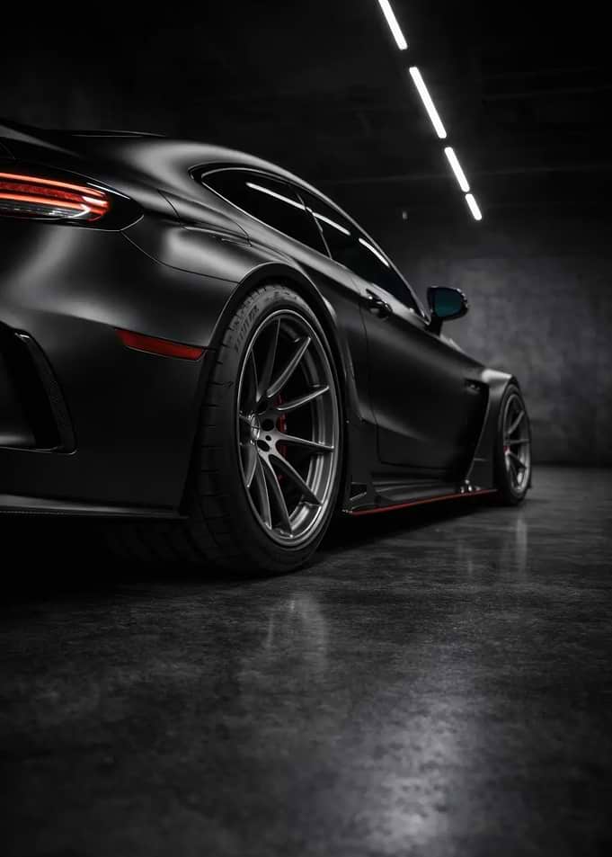 Matte Black Sports Car in Garage