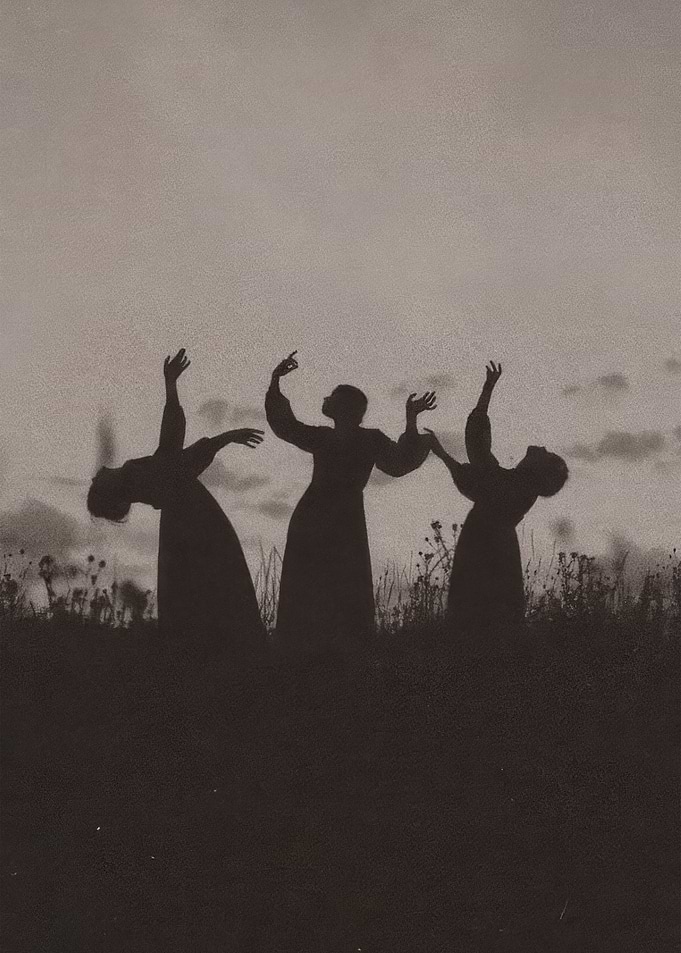 Silhouettes of Three Women Dancing