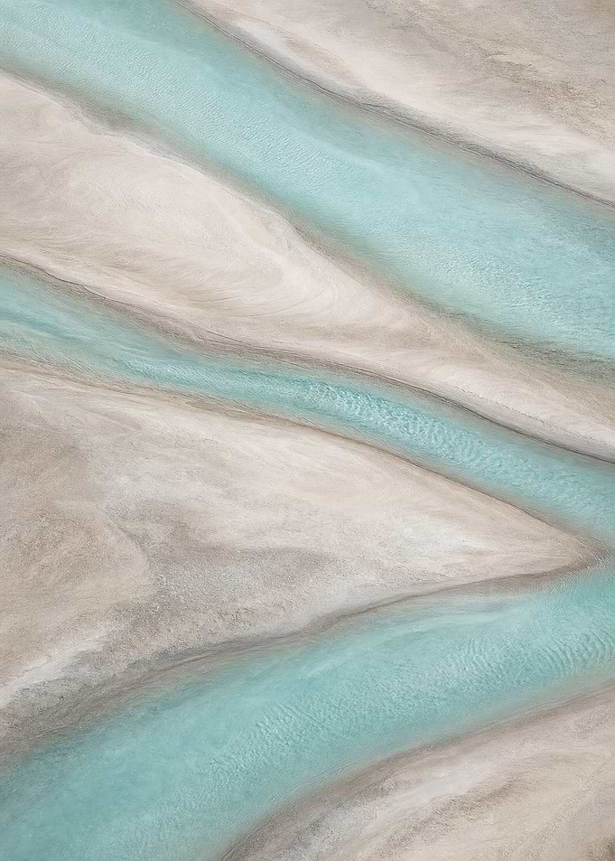 Turquoise Tidal Channels in White Sand