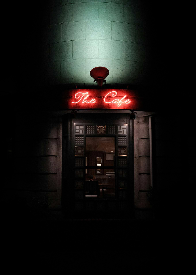 Neon Sign The Cafe Entrance