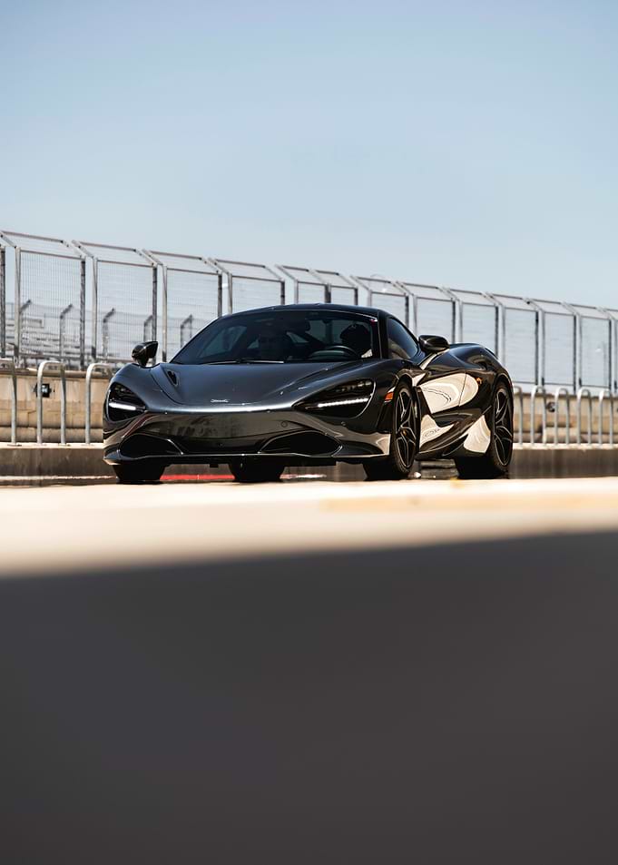 Dark Grey McLaren Supercar on Track