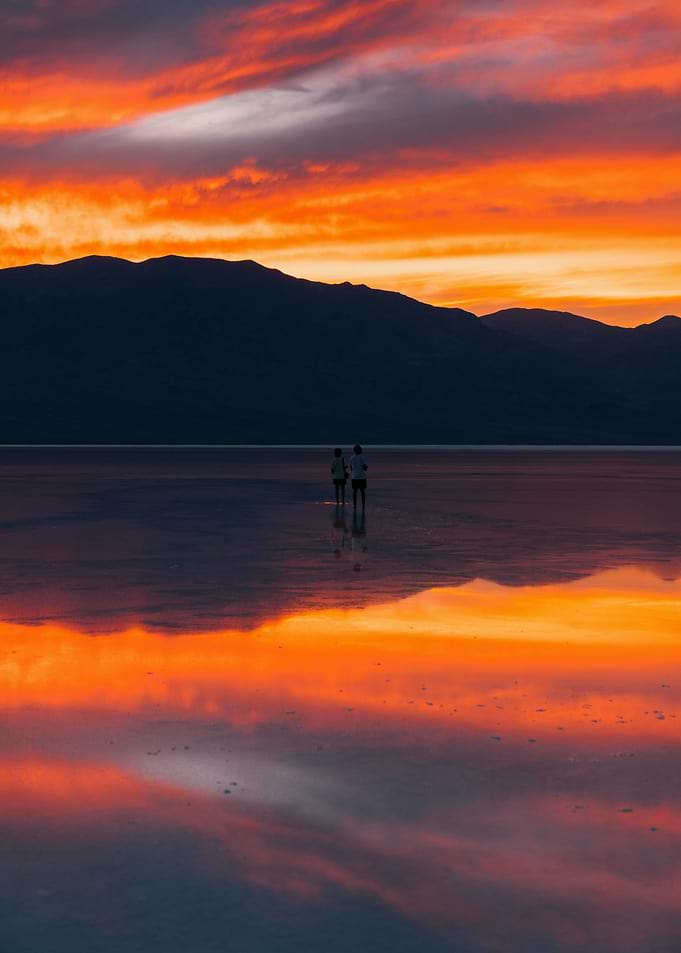 Silhouetted Couple at Sunset Salt Flats
