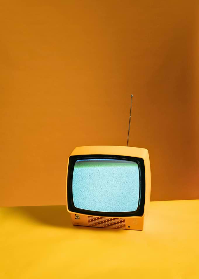 Vintage Yellow Television with Static