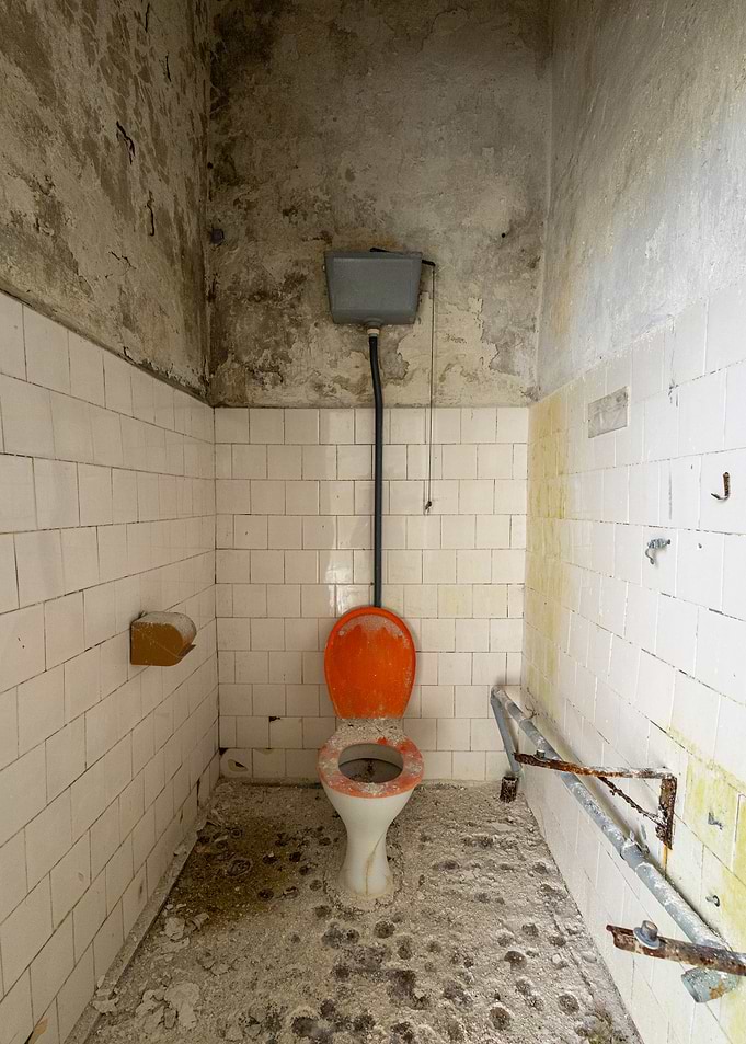 Abandoned Dilapidated Restroom Interior