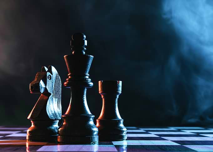 Dramatic Chess Pieces in Smoke