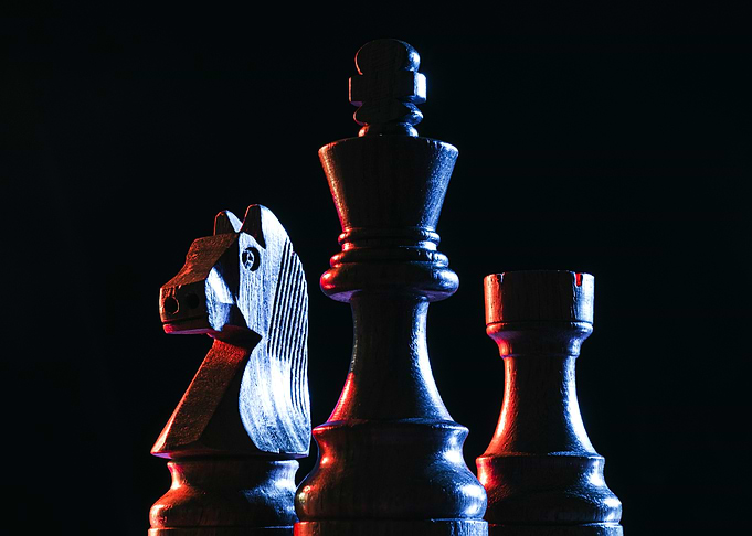 Chess Pieces with Dramatic Lighting