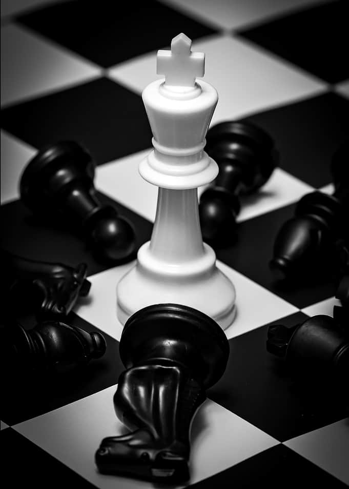 Chess White King Standing Among Fallen Pieces