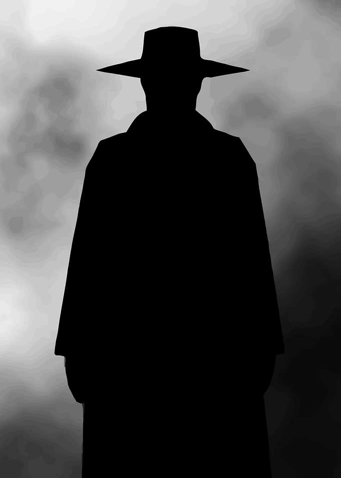 Silhouette of a Man in Hat