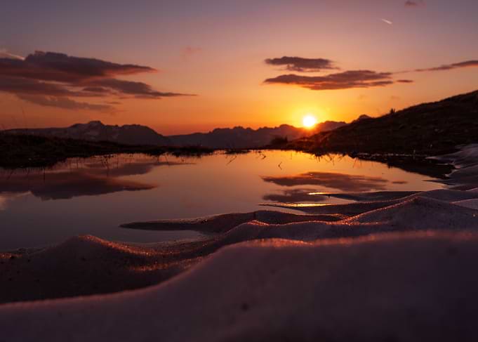 Mountain Sunset Reflection in Snow