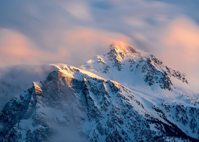 Snowy Mountain Peaks at Sunset