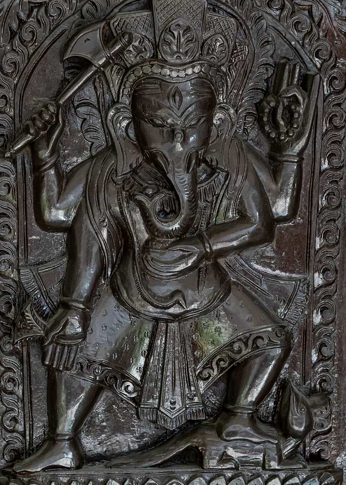 Intricate Wooden Carving of Lord Ganesha