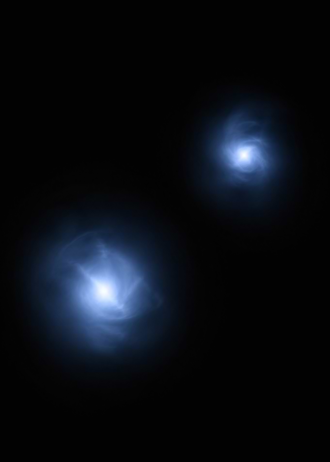 Two Glowing Blue Nebulae