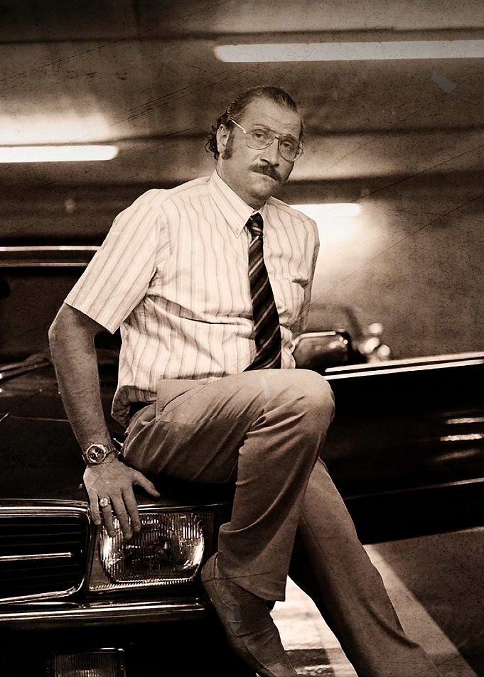 Vintage Style Man Leaning on Car