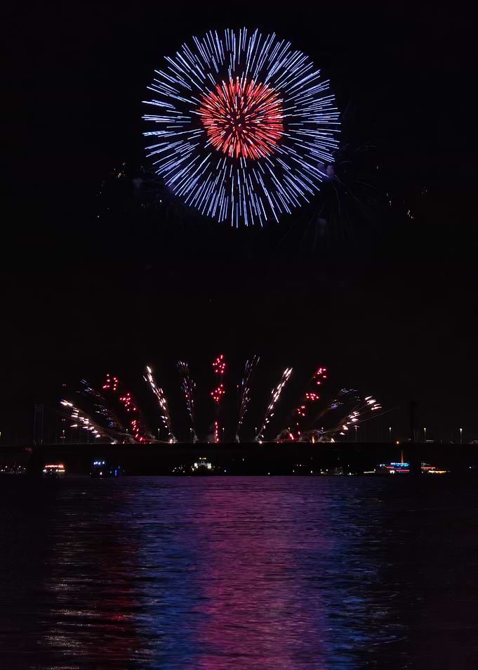 Fireworks Display Over a Bridge