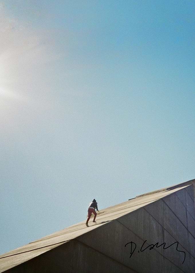Person climbing a concrete structure