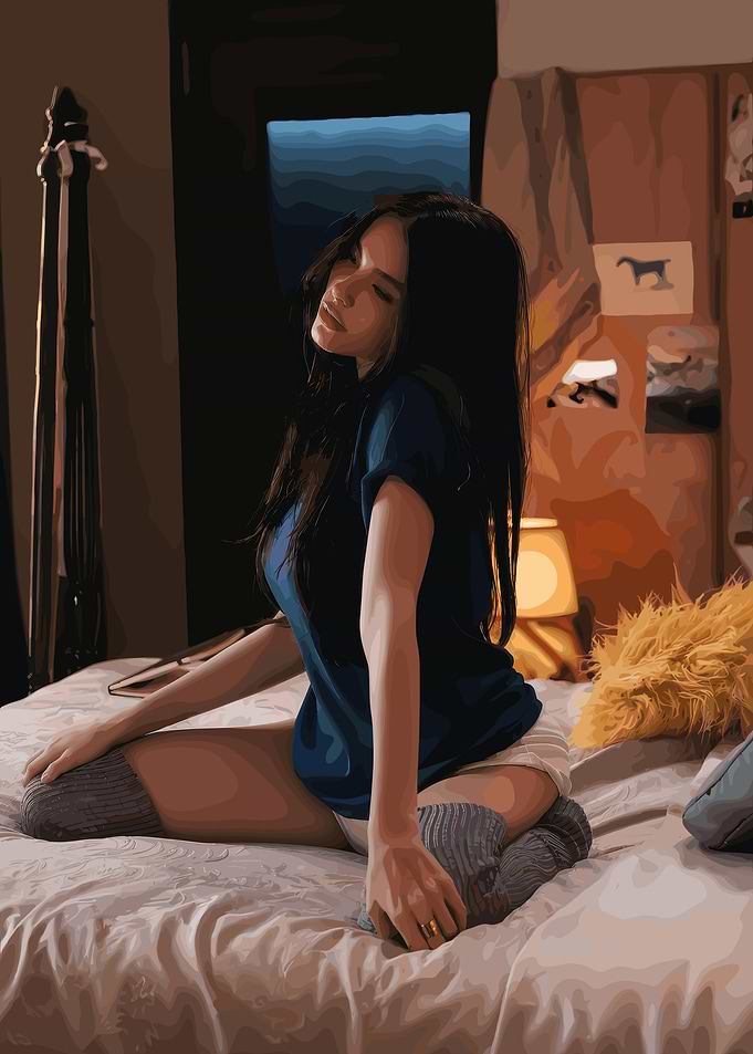 Young woman relaxing on bed