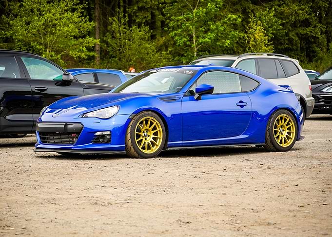 Blue Subaru BRZ with Gold Wheels