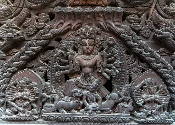Intricate Nepalese Wood Carving of Deity