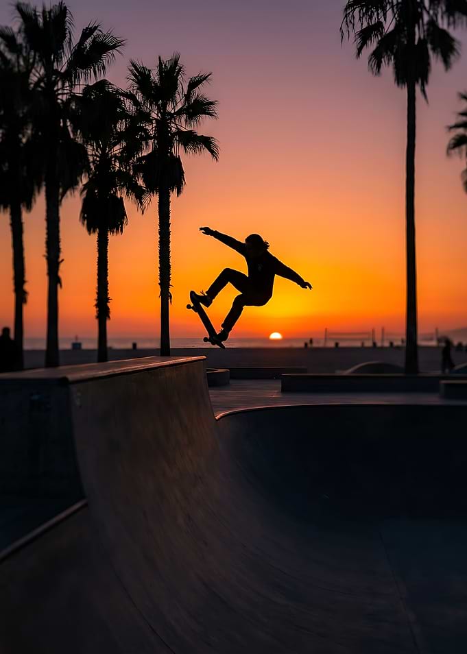 Skateboarder silhouette at sunset