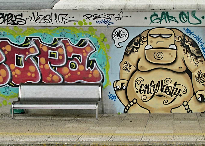 Graffiti Wall with Metal Bench
