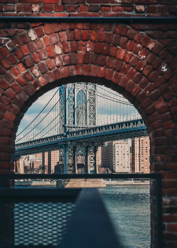 Manhattan Bridge Through Brick Archway