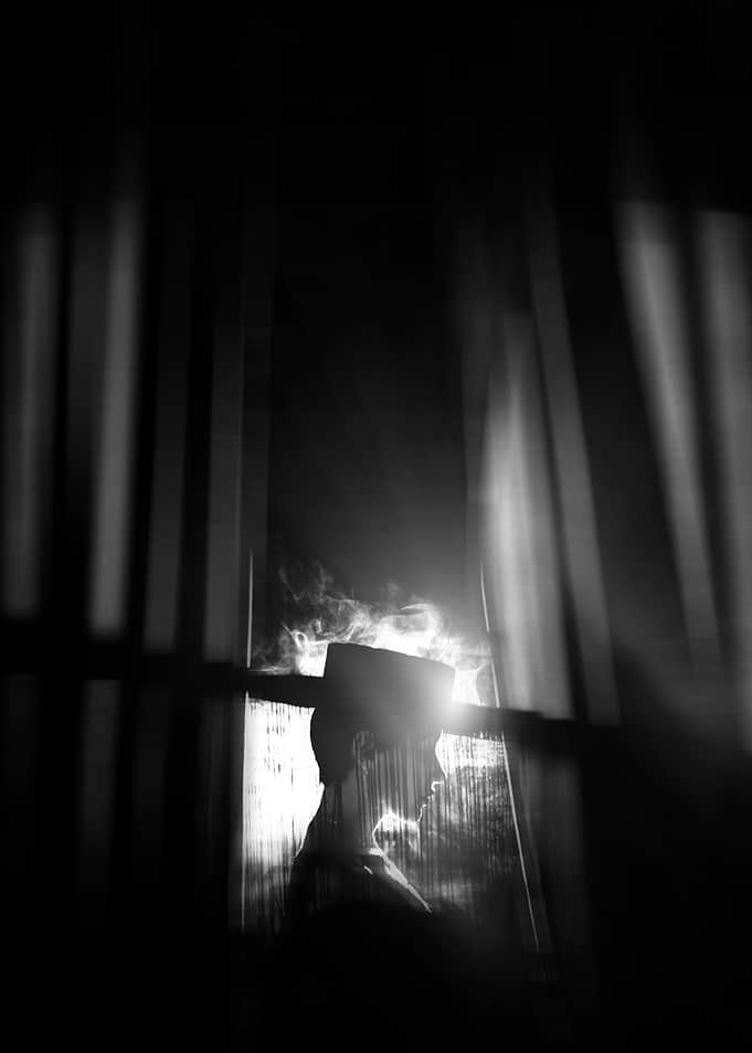 Silhouette of a Person in Hat