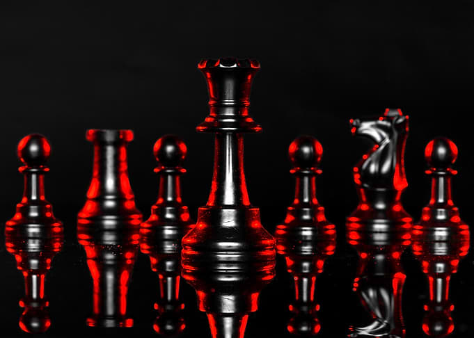 Black Chess Pieces with Red Accents