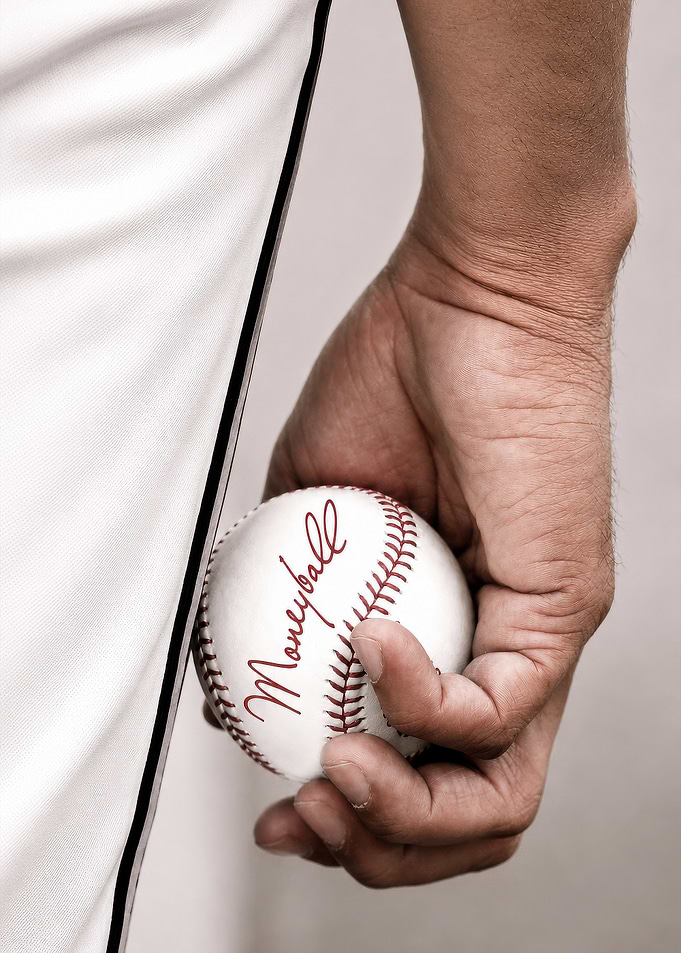 Moneyball Baseball Held by Player