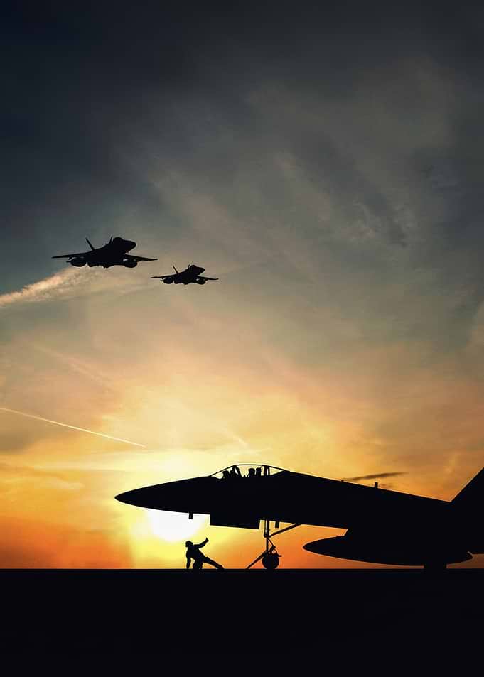 Military Jet Silhouette at Sunset