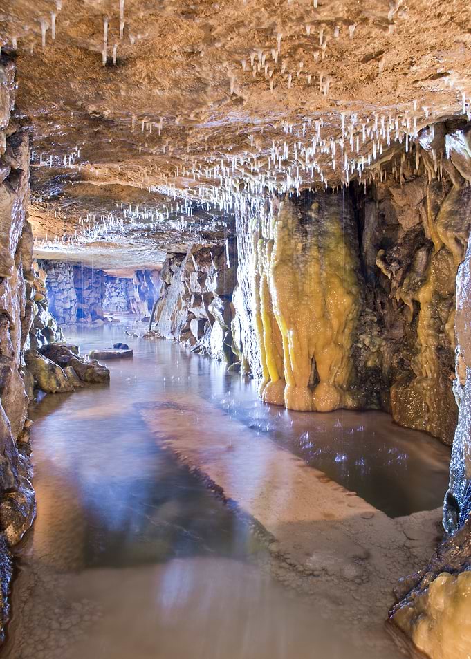 Underground Limestone quarry with Water Stream