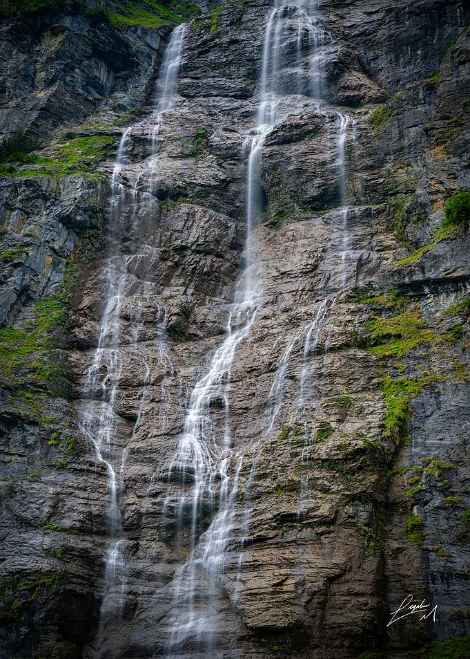 Majestic Waterfall on Rocky Cliff