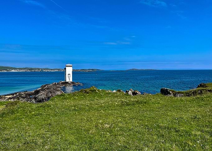 White Lighthouse on Rocky Headland - Coastal Islay Photography