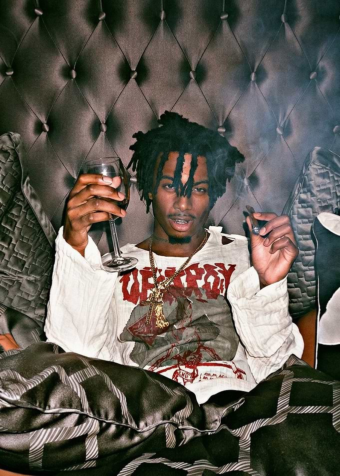 Playboi Carti Relaxing with Wine