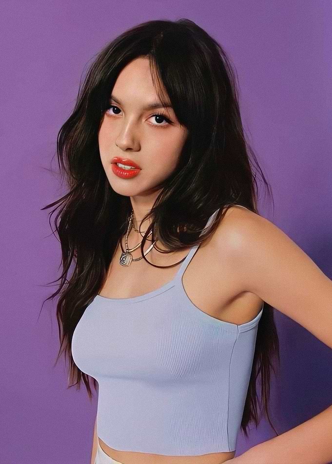 Olivia Rodrigo Portrait Against Purple Background