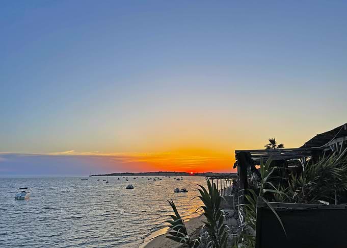 Serene Sunset Over Coastal Waters