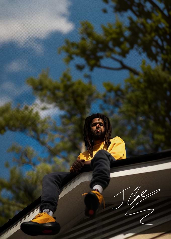 J. Cole Sitting on a Roof
