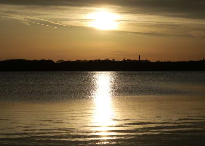 Golden Sunset Over Calm Lake