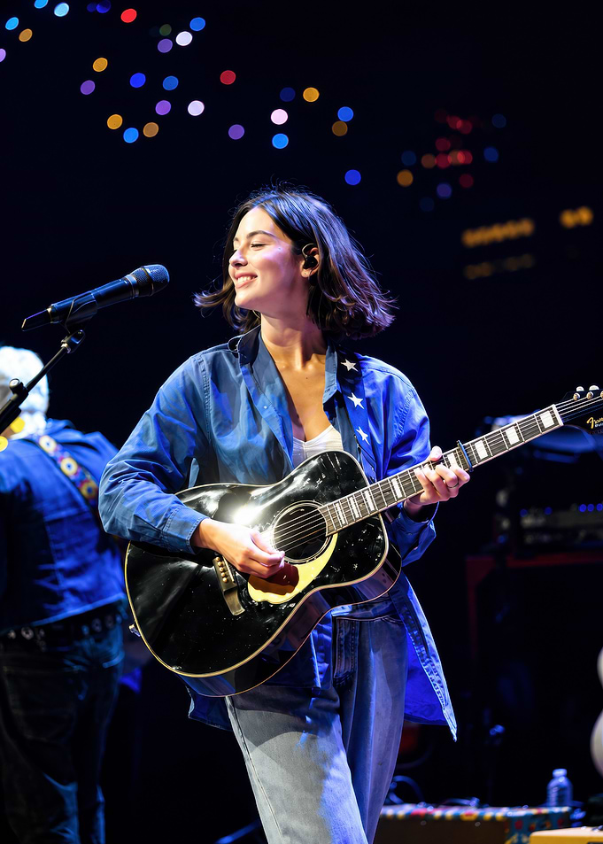 Gracie Abrams performing live on stage