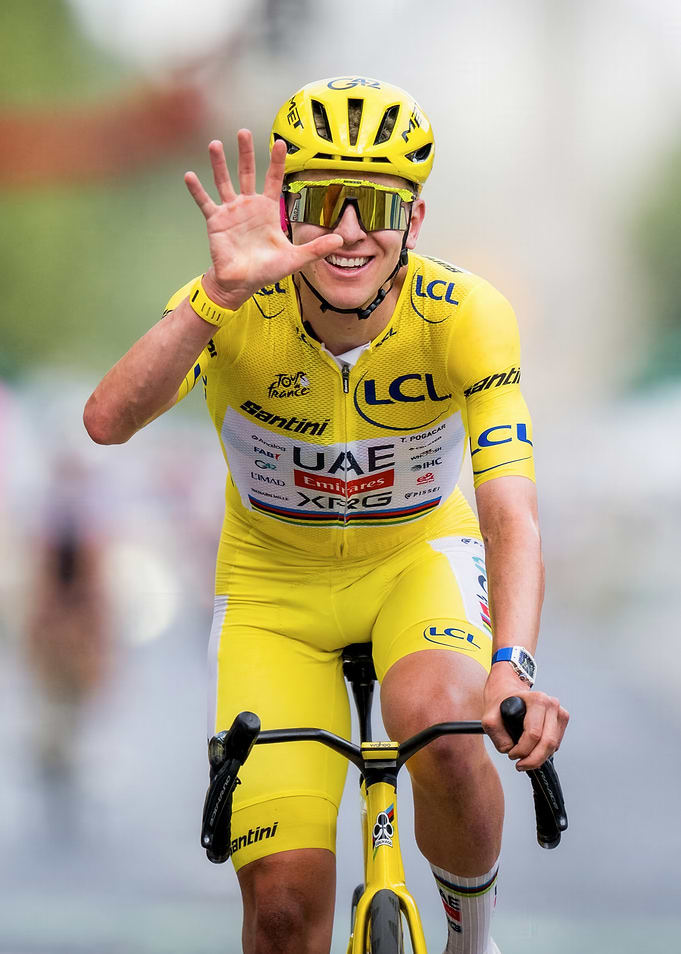 Tadej Pogačar Celebrating Tour de France Victory