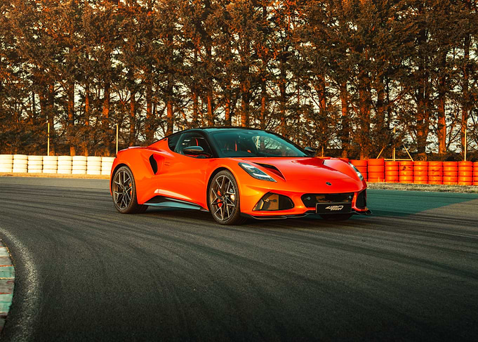 Orange Lotus Emira on Racetrack
