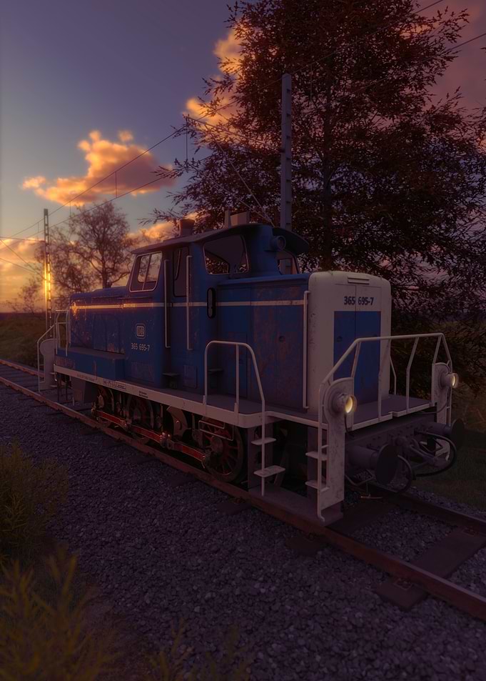 Blue Diesel Locomotive at Sunset
