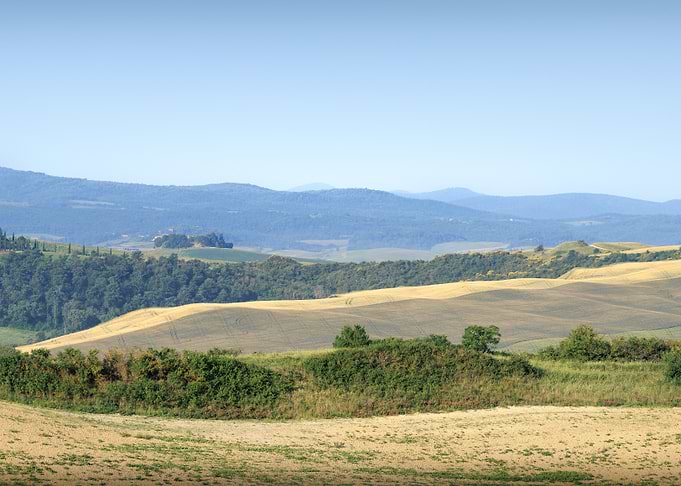 Toscana - Rolling Hills and Distant Mountains