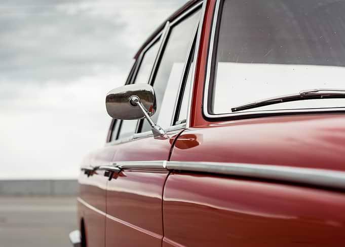Close-up of a vintage red car