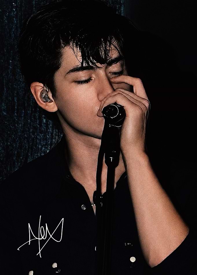 Alex Turner Singing into Microphone