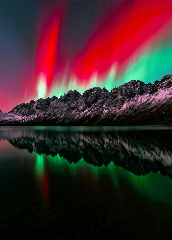 Aurora Borealis Over Mountain Lake